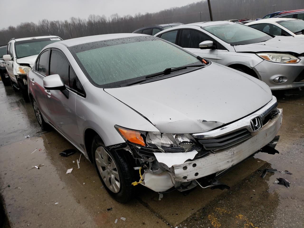 HONDA CIVIC LX 2012 with VIN JHMFB2F59CS000251 - Photo from auction