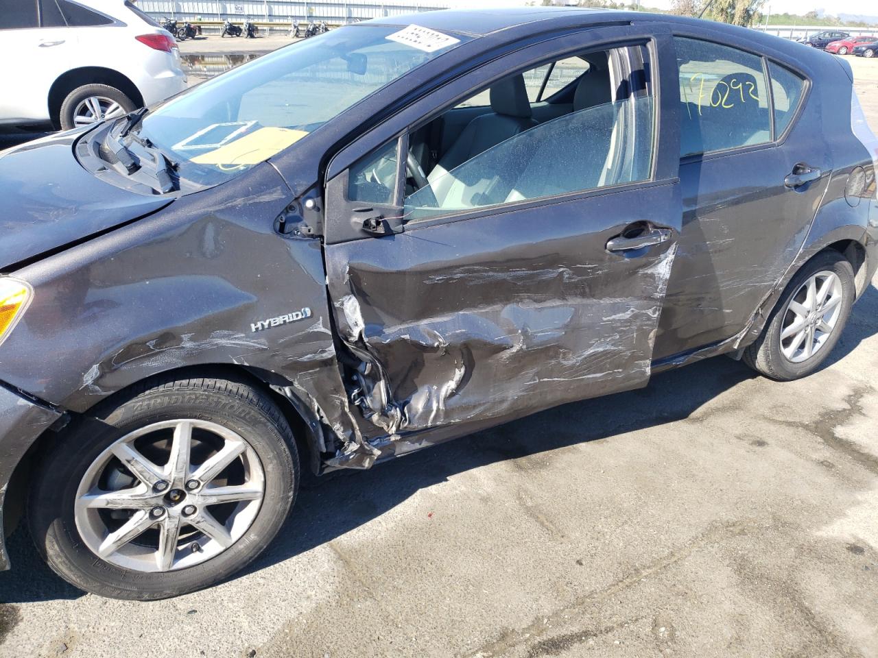 Photo 9 from auction – 2012 TOYOTA PRIUS C with VIN JTDKDTB33C1010123
