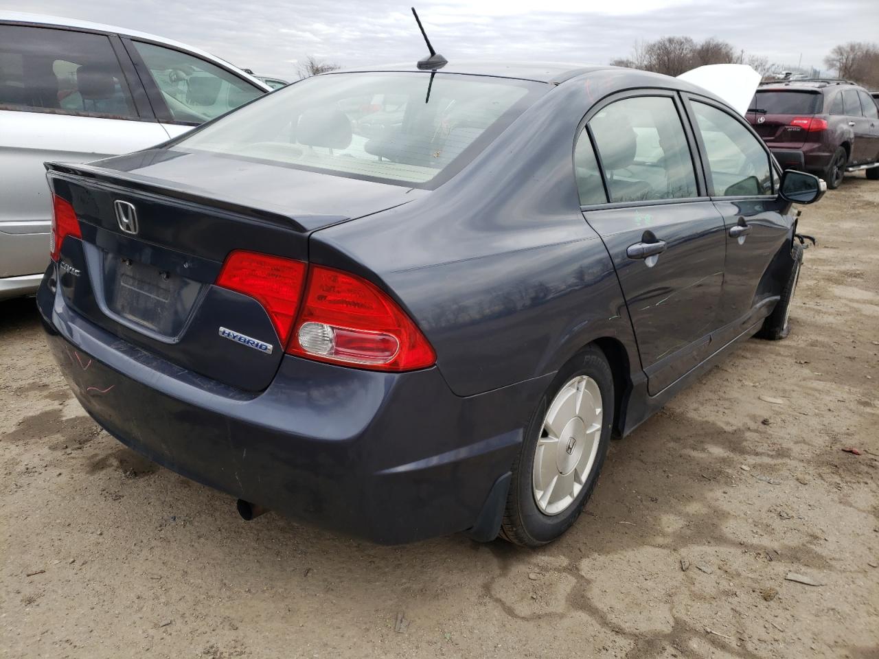 Photo 4 from auction – 2007 HONDA CIVIC HYBR with VIN JHMFA36257S019836