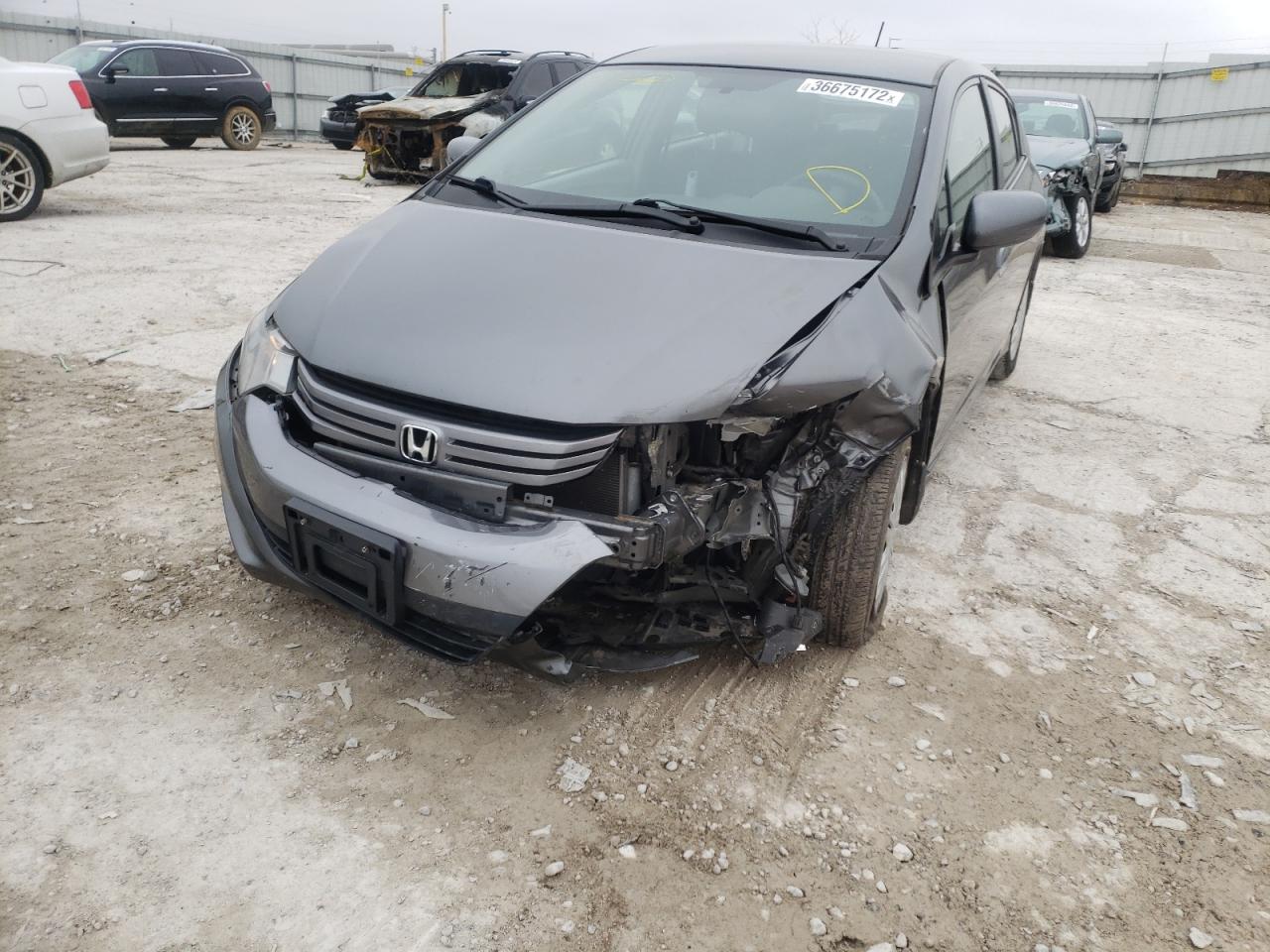 Photo 9 from auction – 2011 HONDA INSIGHT LX with VIN JHMZE2H57BS012866
