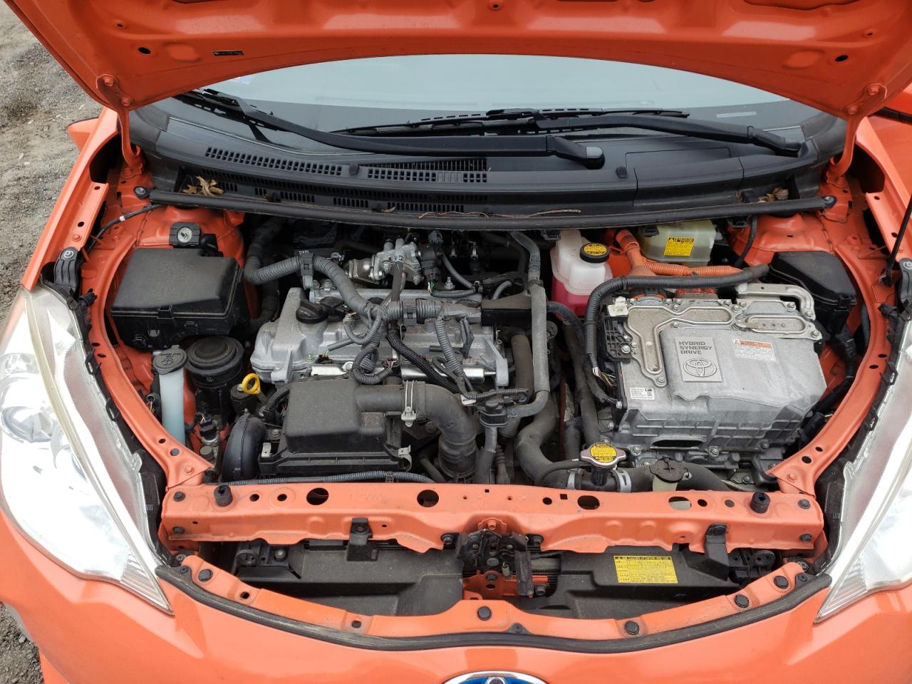 Photo 7 from auction – 2014 TOYOTA PRIUS C with VIN JTDKDTB3XE1066272