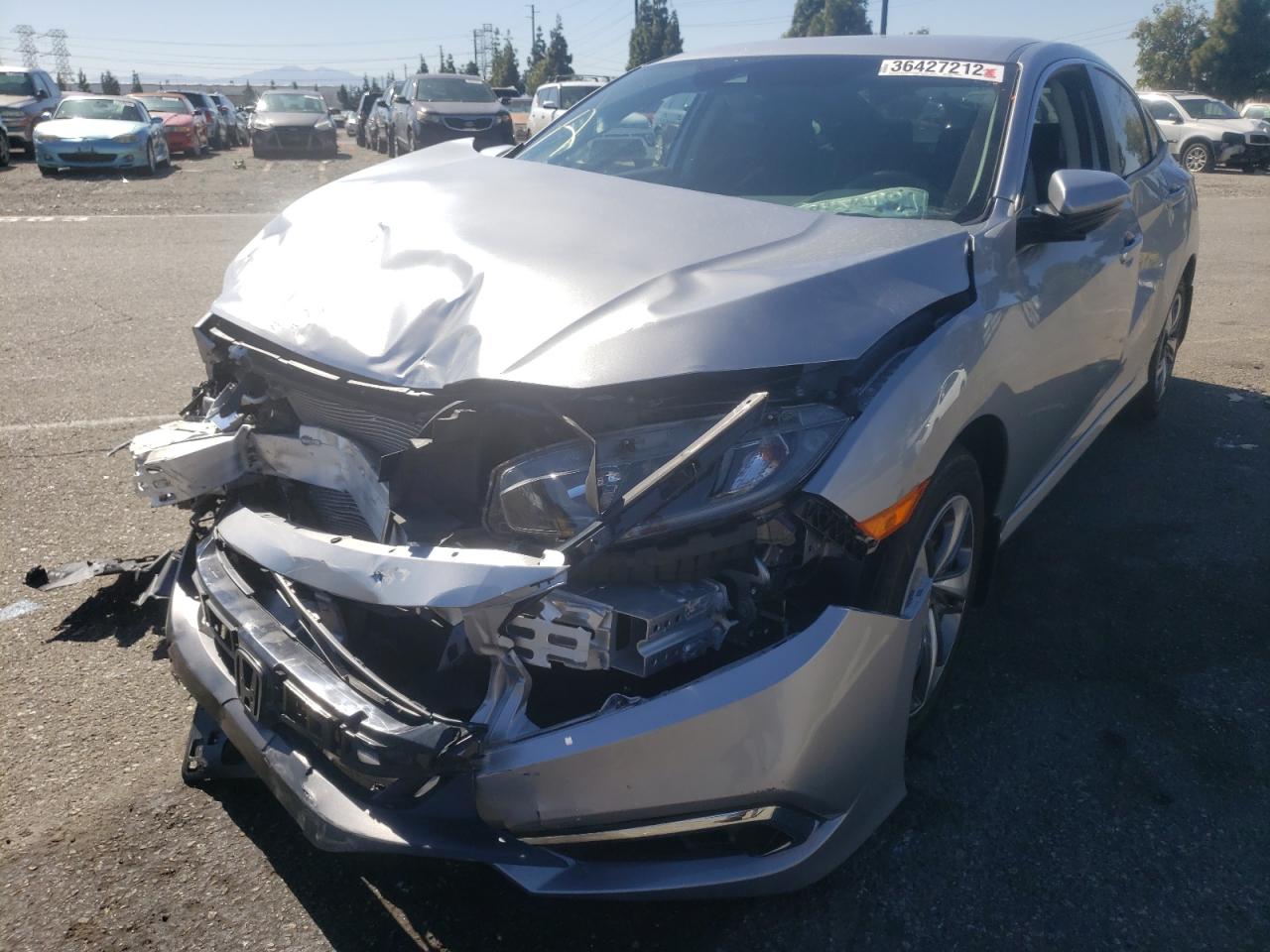 Photo 2 from auction – 2019 HONDA CIVIC LX with VIN 2HGFC2F64KH518170