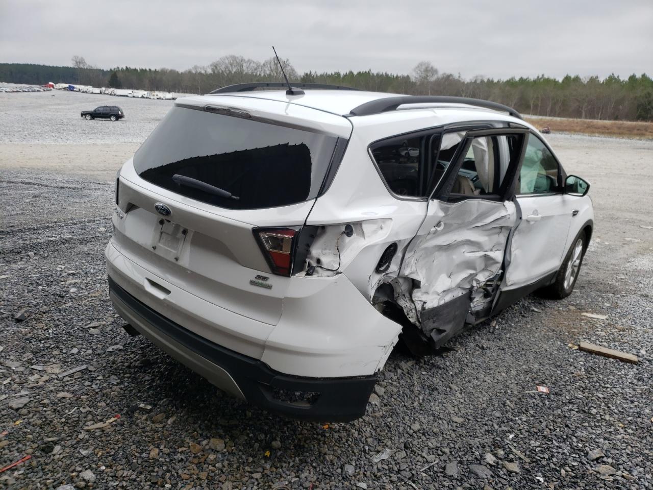 Photo 4 from auction – 2018 FORD ESCAPE SE with VIN 1FMCU0GD3JUD25757