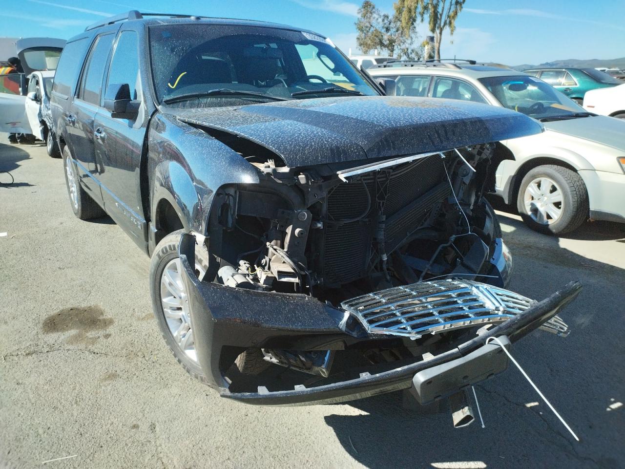 Photo 9 from auction – 2013 LINCOLN NAVIGATOR with VIN 5LMJJ3H50DEL05129