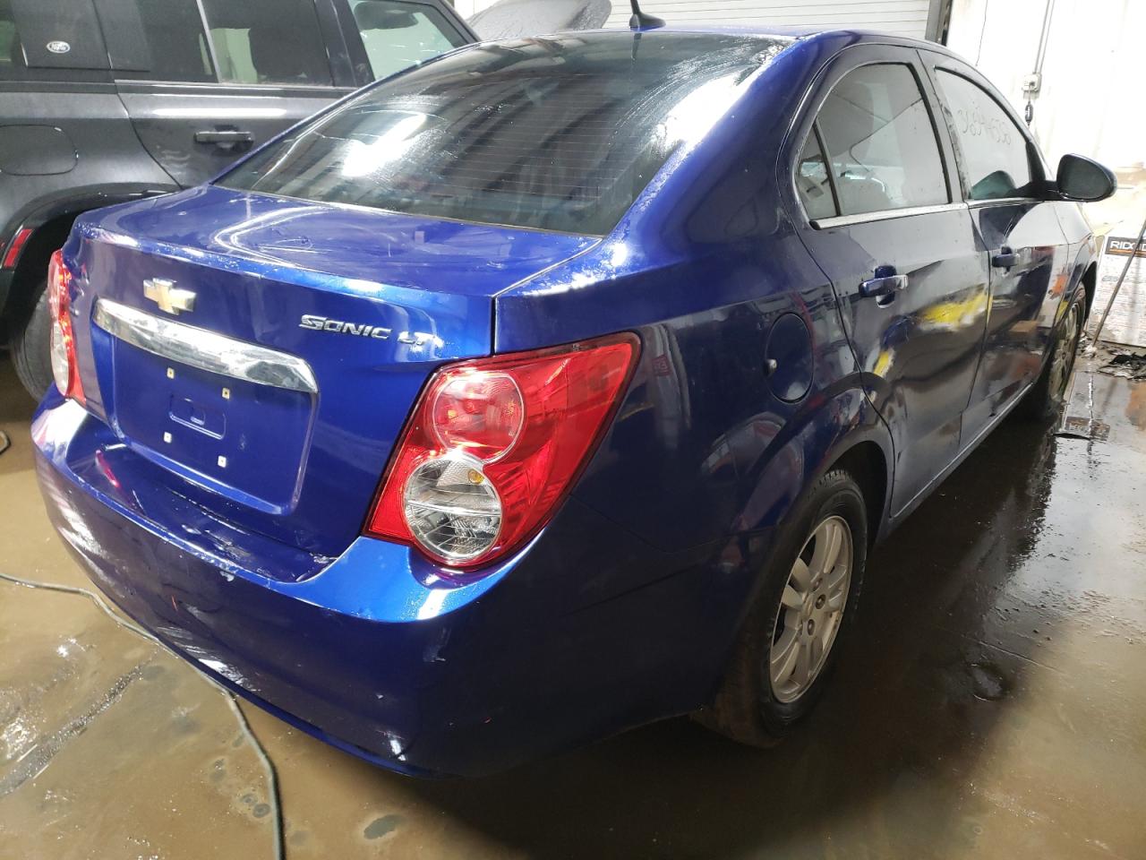 Photo 4 from auction – 2014 CHEVROLET SONIC LT with VIN 1G1JC5SH4E4182399