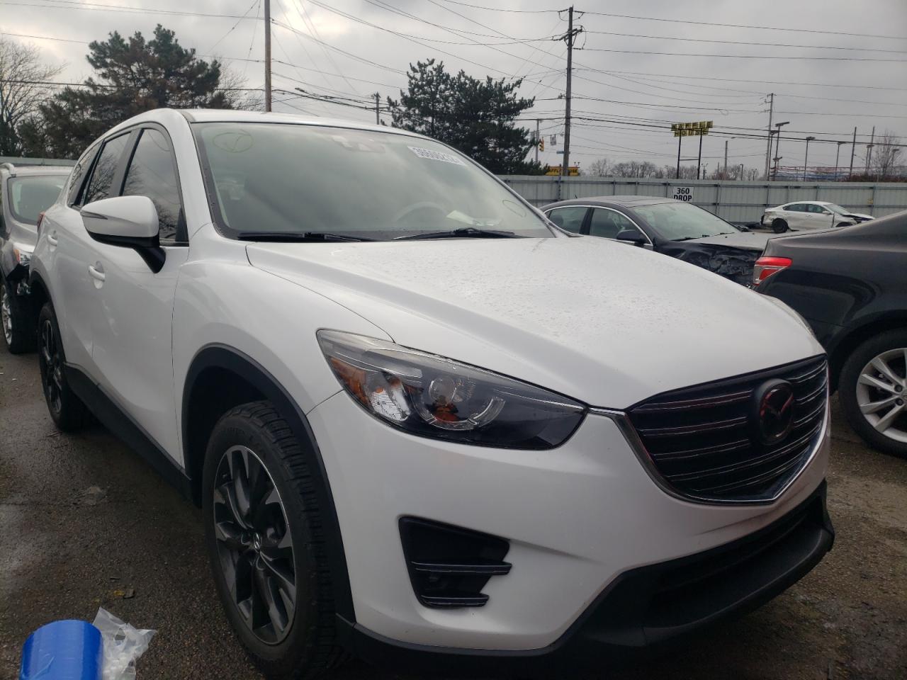 MAZDA CX-5 GT 2016 with VIN JM3KE4DY0G0746595 - Photo from auction