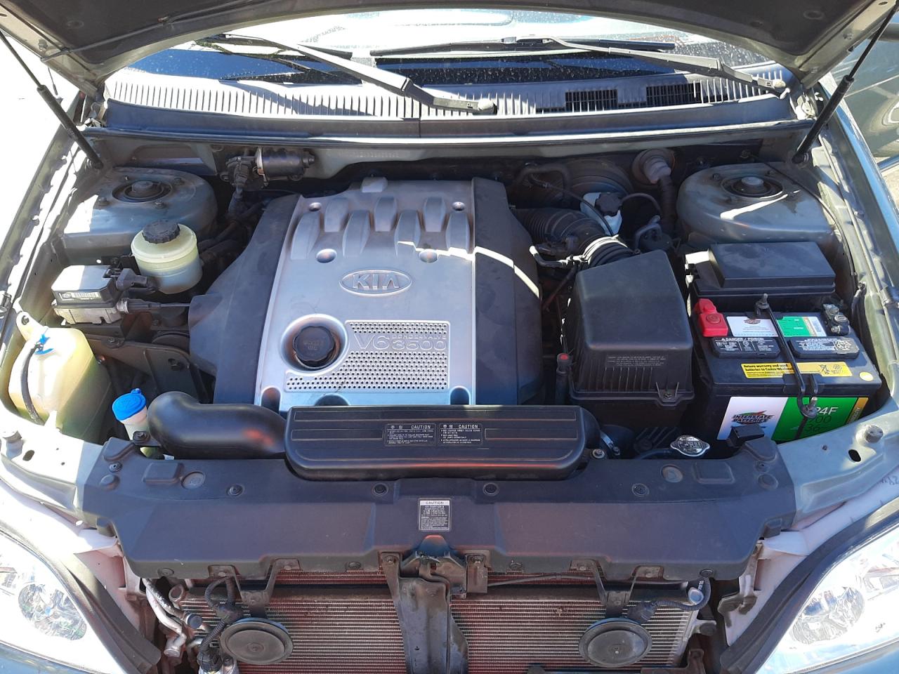 Photo 7 from auction – 2003 KIA SEDONA EX with VIN KNDUP131X36425945