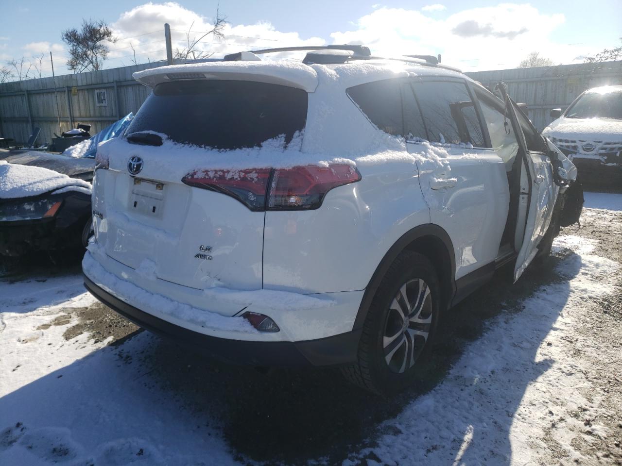 Photo 4 from auction – 2017 TOYOTA RAV4 LE with VIN JTMBFREV2HJ163870