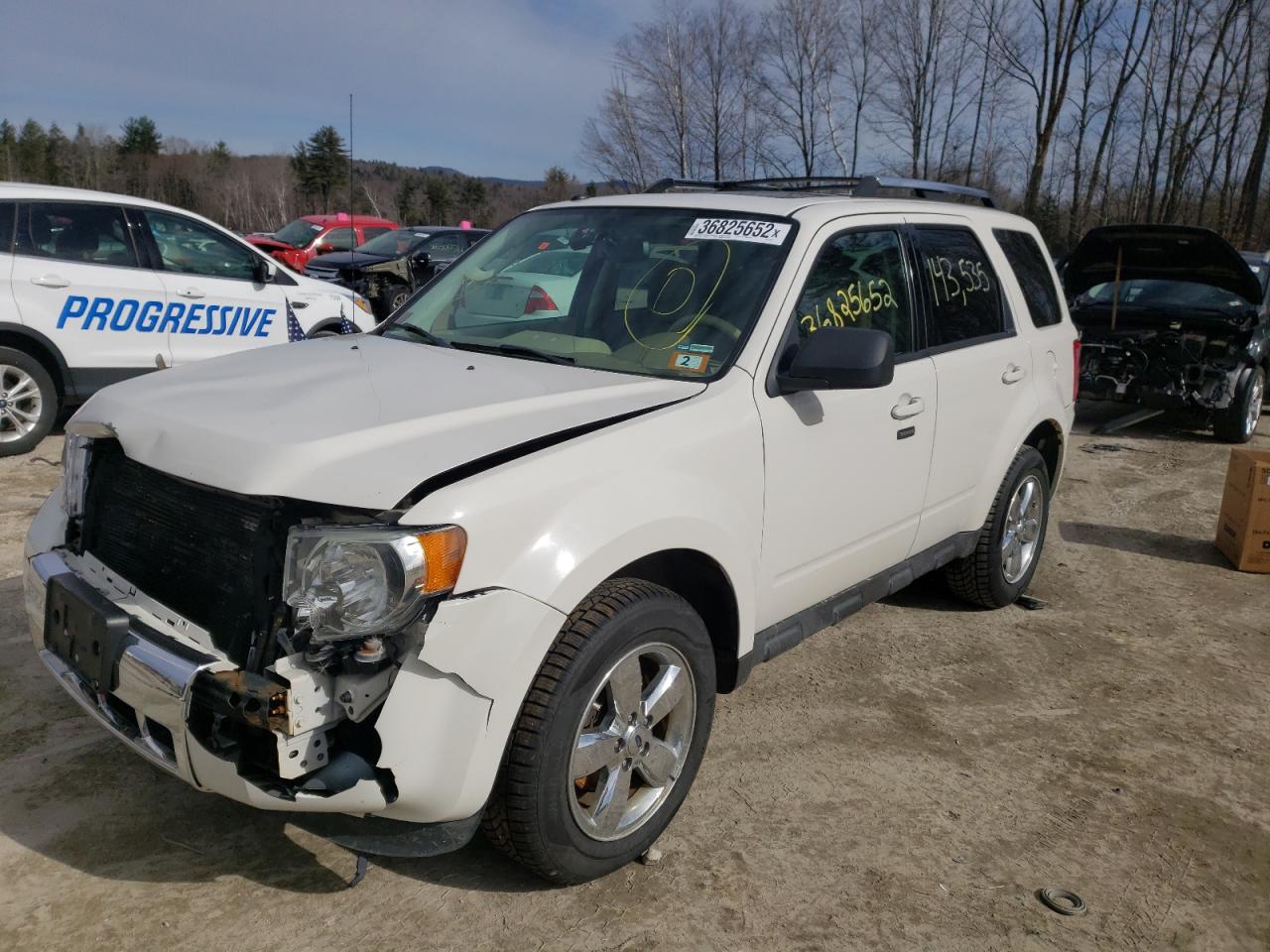 Photo 2 from auction – 2011 FORD ESCAPE LIM with VIN 1FMCU9E75BKC59274