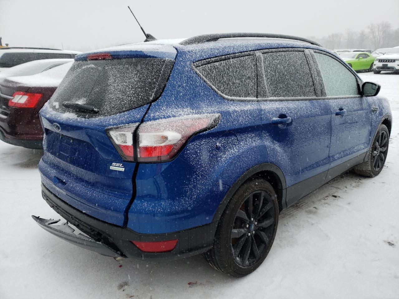 Photo 4 from auction – 2018 FORD ESCAPE SEL with VIN 1FMCU0HD2JUD27840