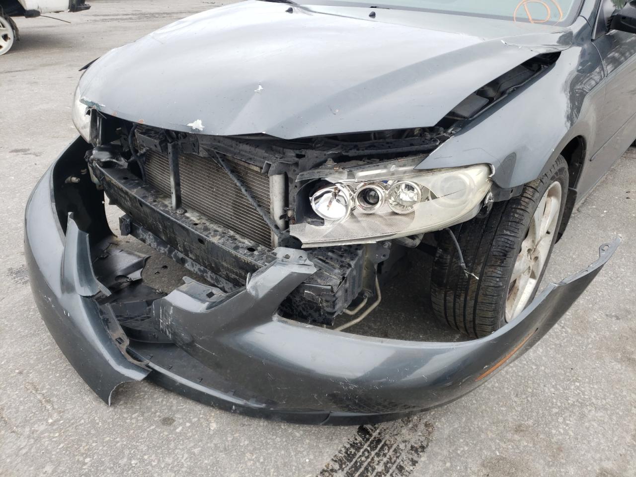 Photo 9 from auction – 2005 MAZDA 6 I with VIN 1YVHP80C355M69143