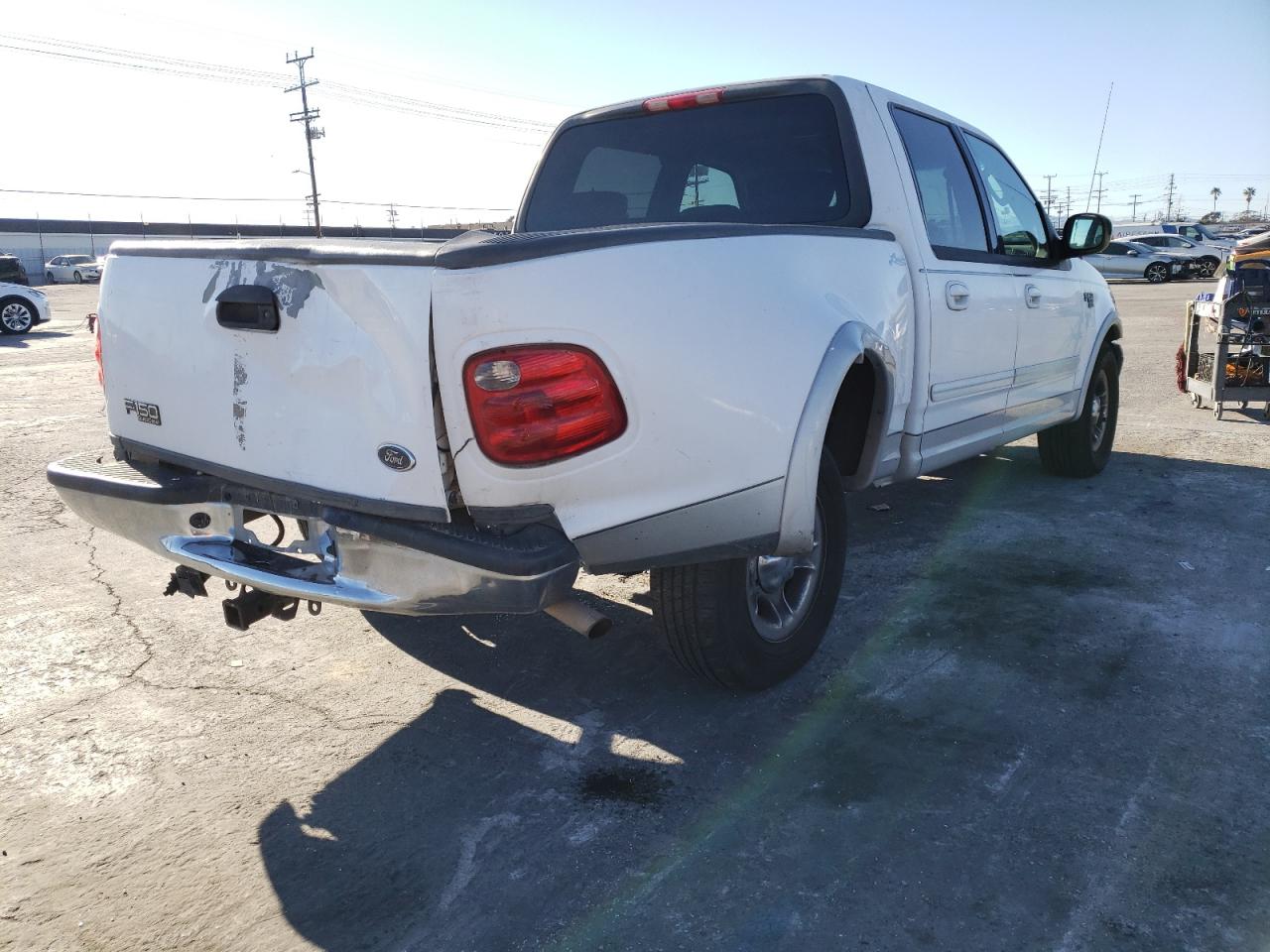 Photo 4 from auction – 2002 FORD F150 SUPER with VIN 1FTRW07L02KE33489