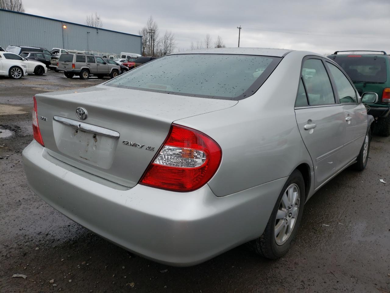 Photo 4 from auction – 2004 TOYOTA CAMRY LE with VIN 4T1BE30K34U926061