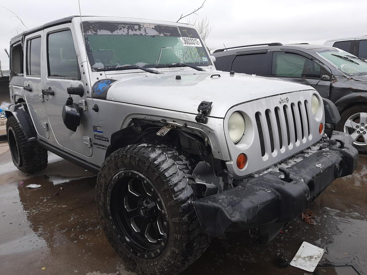 JEEP WRANGLER U 2011 with VIN 1J4BA3H18BL610034 - Photo from auction