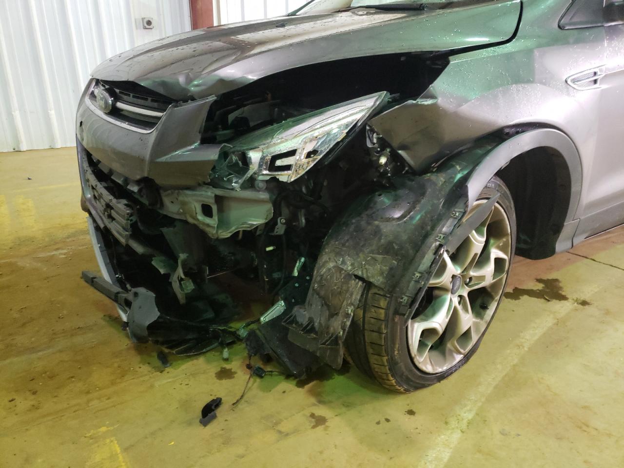 Photo 9 from auction – 2014 FORD ESCAPE TIT with VIN 1FMCU0J91EUC92204