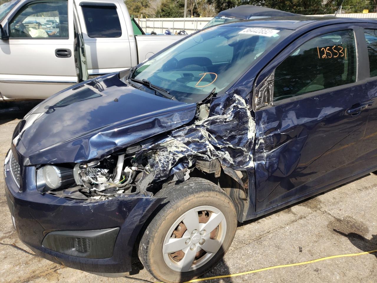Photo 9 from auction – 2015 CHEVROLET SONIC LS with VIN 1G1JB5SH8F4138412