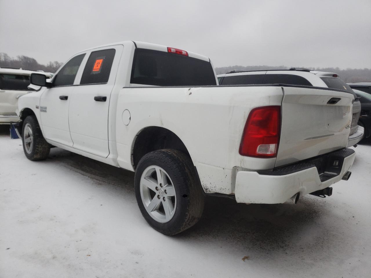 Foto 3 de la subasta – 2016 RAM 1500 ST con VIN 3C6RR7KT7GG275780