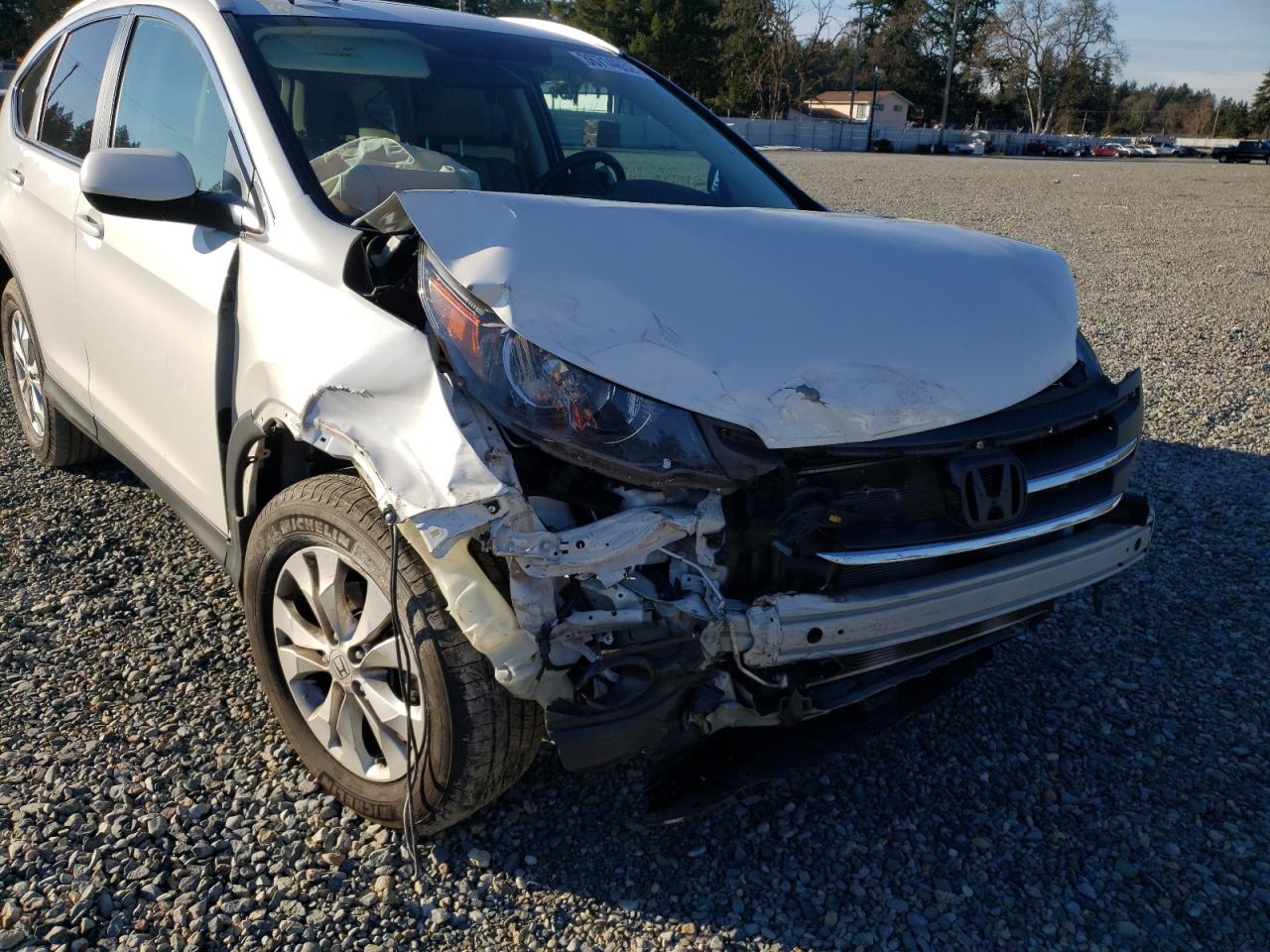 Photo 9 from auction – 2014 HONDA CR-V EXL with VIN 5J6RM4H74EL054793