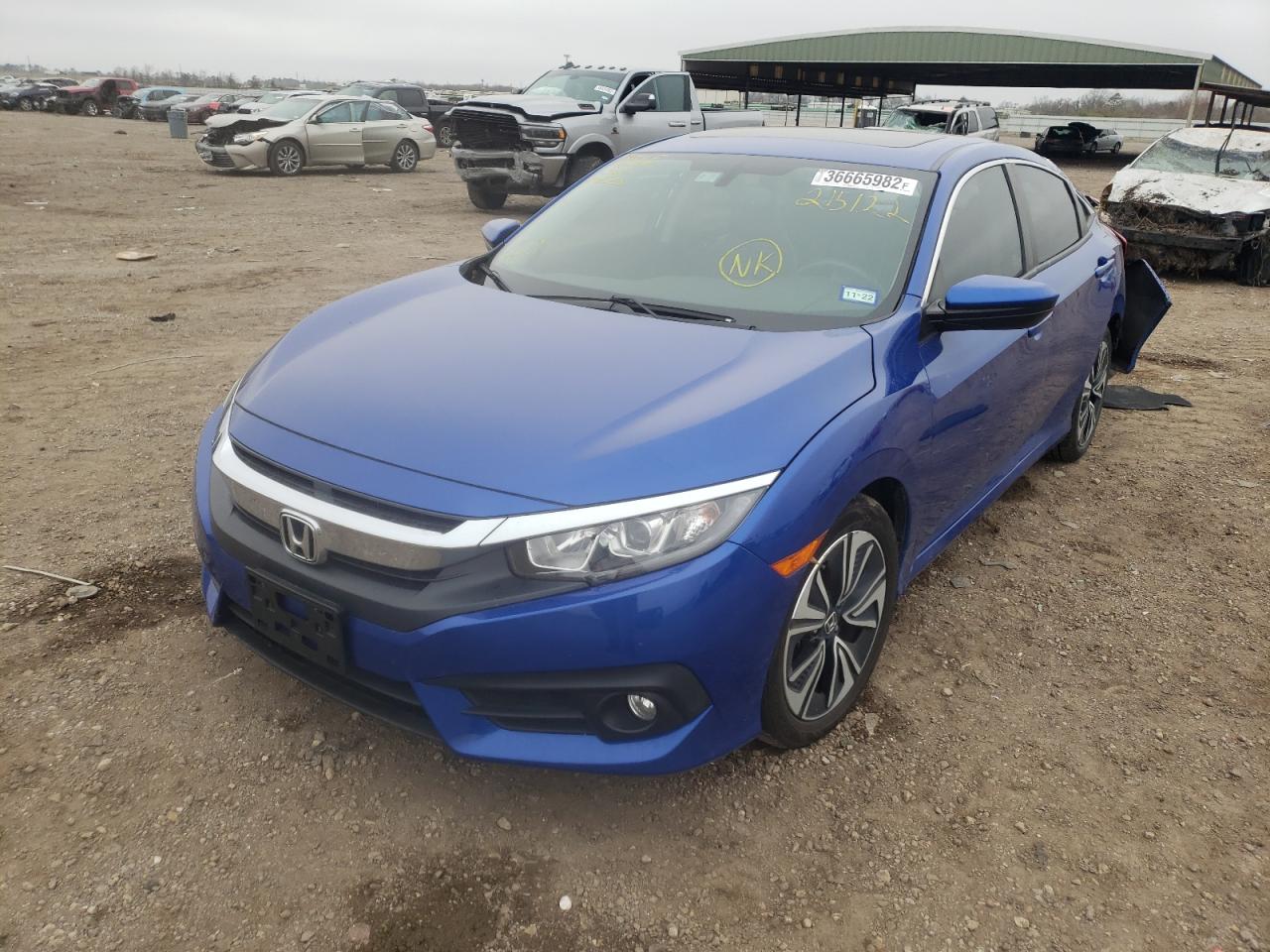 Photo 2 from auction – 2017 HONDA CIVIC EXL with VIN 19XFC1F74HE215122