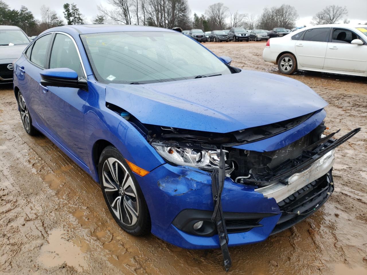 HONDA CIVIC EX 2016 with VIN 2HGFC1F32GH653946 - Photo from auction