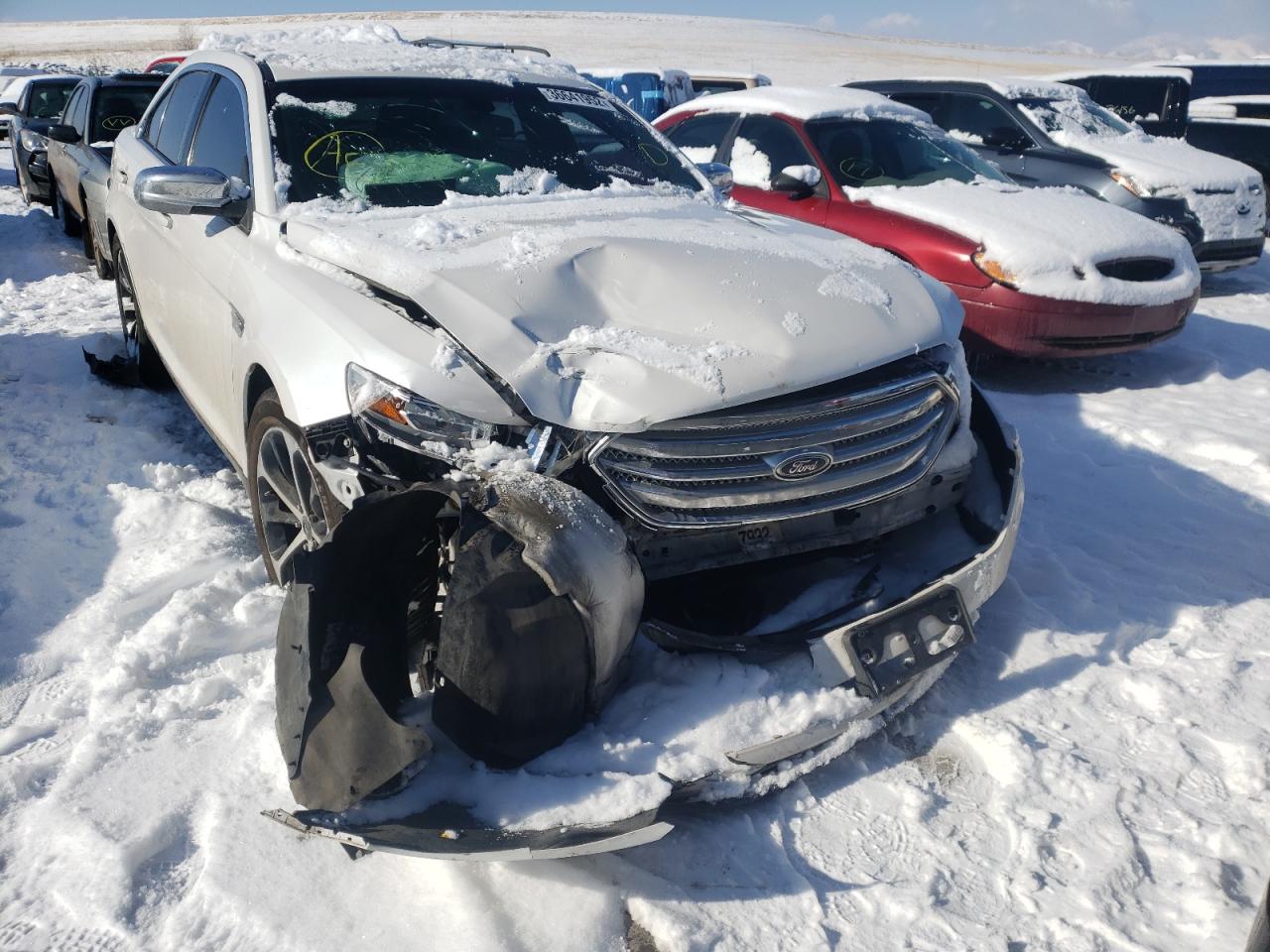 FORD TAURUS SEL 2014 with VIN 1FAHP2E85EG119675 - Photo from auction