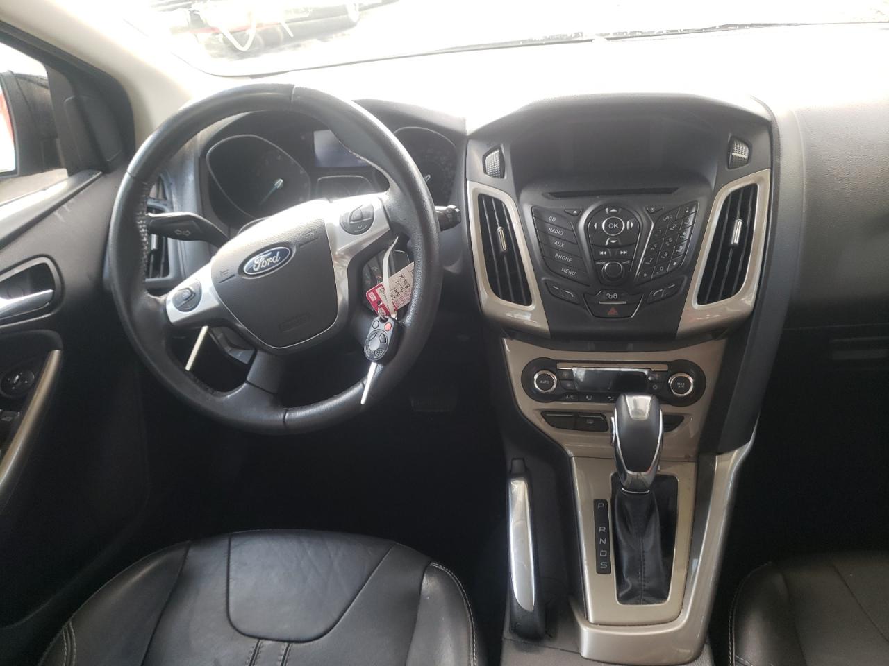 Photo 9 from auction – 2012 FORD FOCUS SEL with VIN 1FAHP3M29CL428251