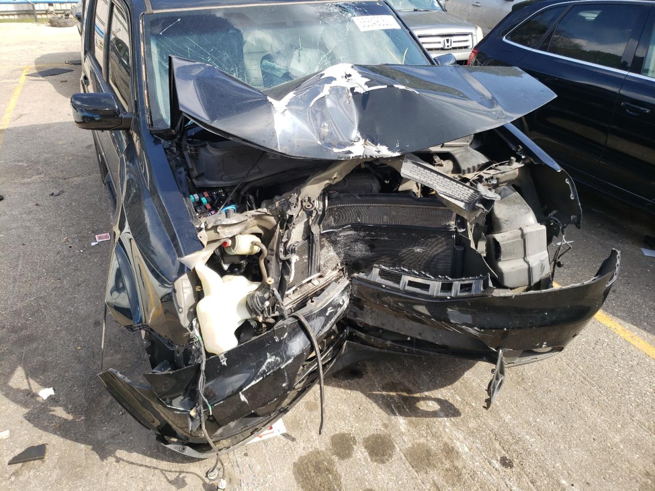 Photo 9 from auction – 2012 HONDA PILOT TOUR with VIN 5FNYF4H99CB052115