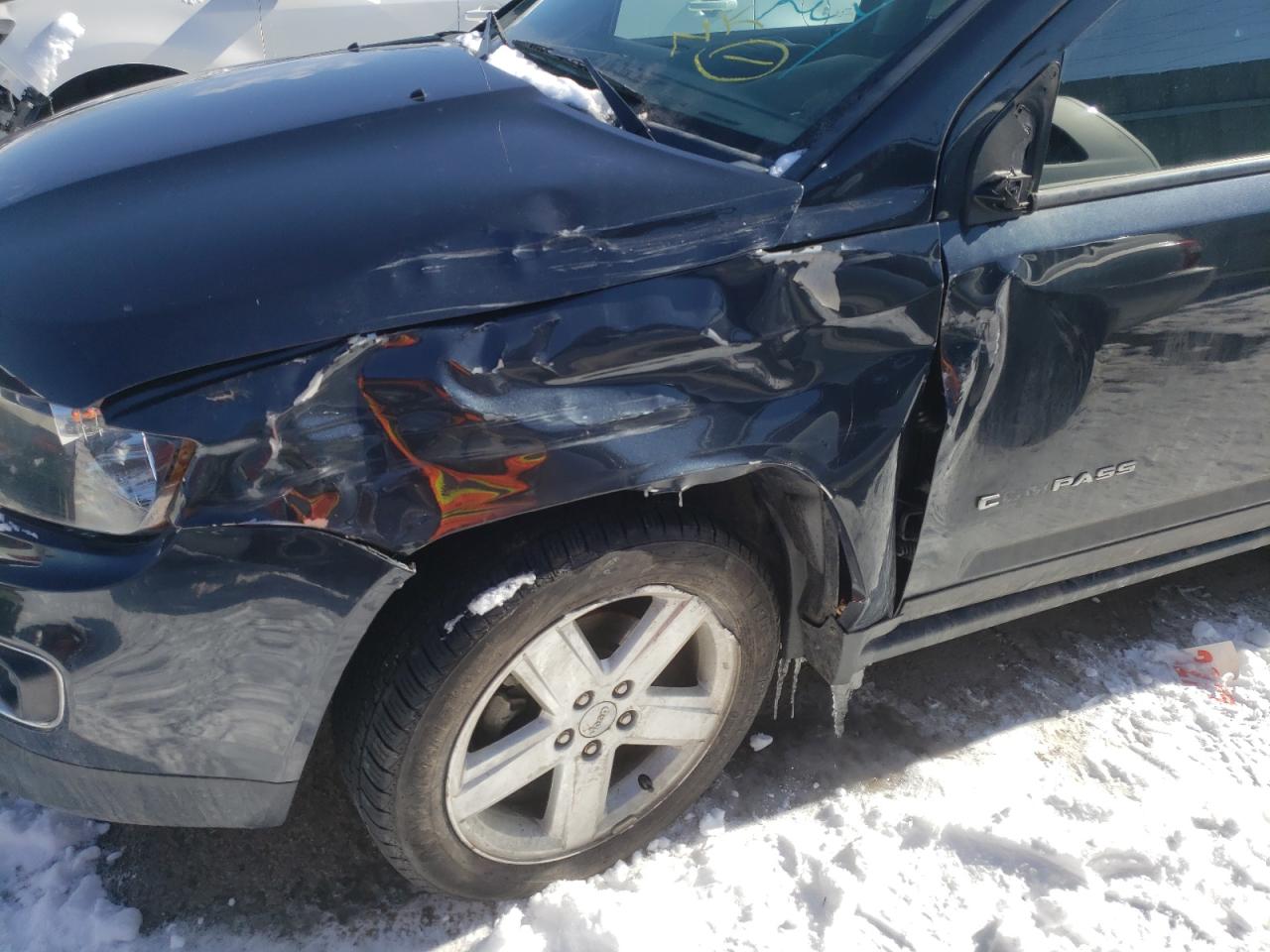 Photo 9 from auction – 2014 JEEP COMPASS LA with VIN 1C4NJCEA0ED753937