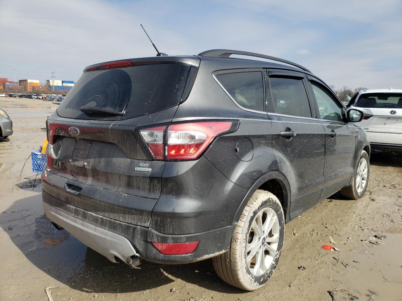 Photo 4 from auction – 2018 FORD ESCAPE SE with VIN 1FMCU0GD6JUC18427