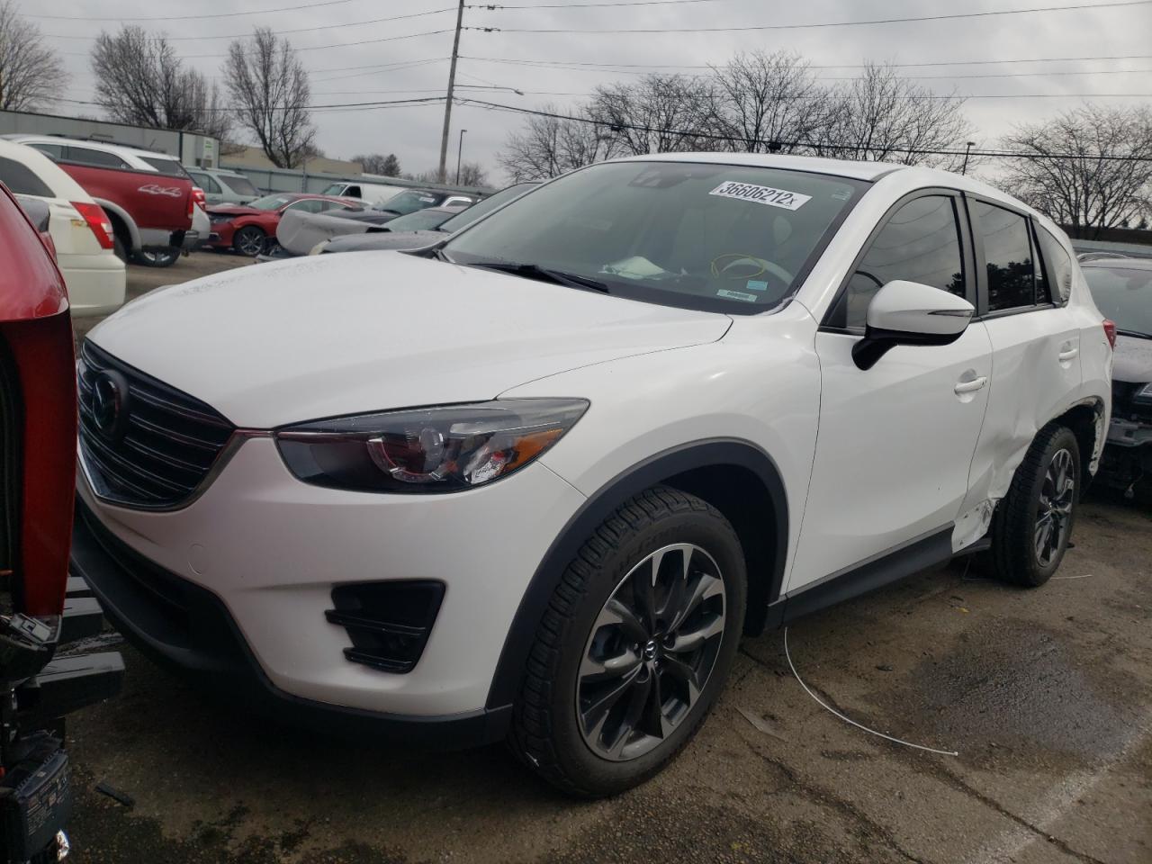Photo 2 from auction – 2016 MAZDA CX-5 GT with VIN JM3KE4DY0G0746595