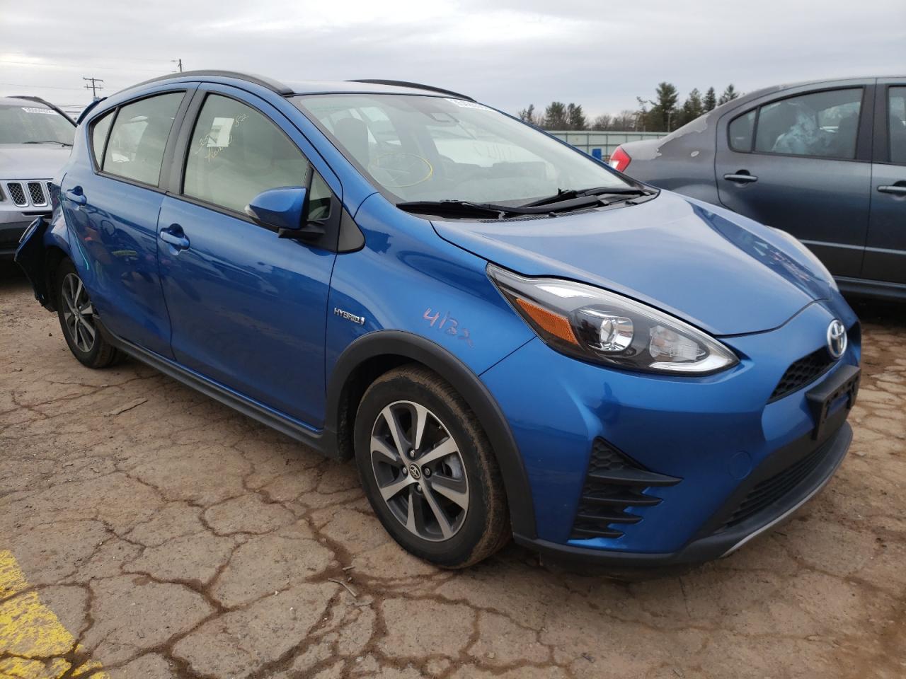 TOYOTA PRIUS C 2018 with VIN JTDKDTB32J1613805 - Photo from auction