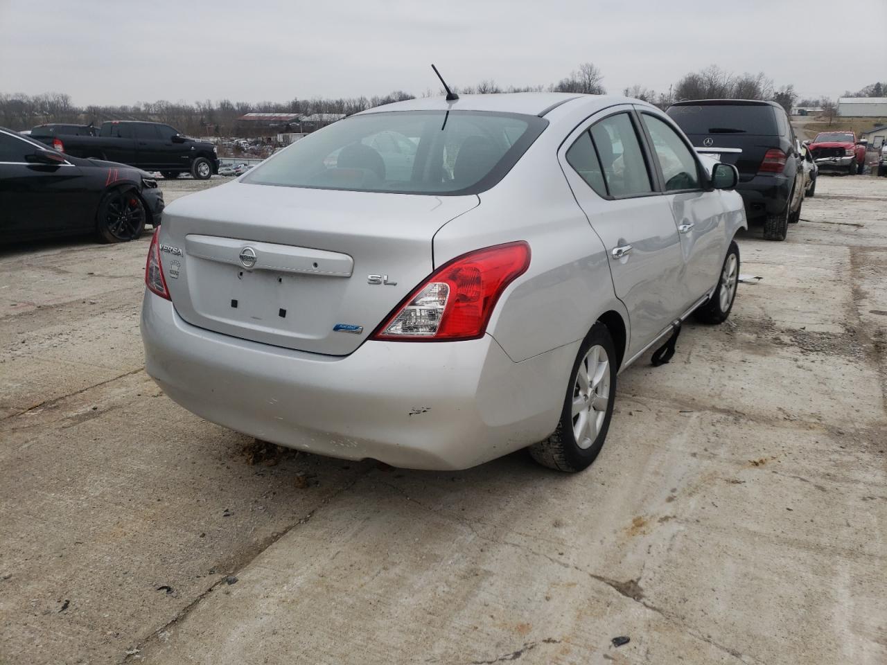 Photo 4 from auction – 2012 NISSAN VERSA S with VIN 3N1CN7AP9CL818324
