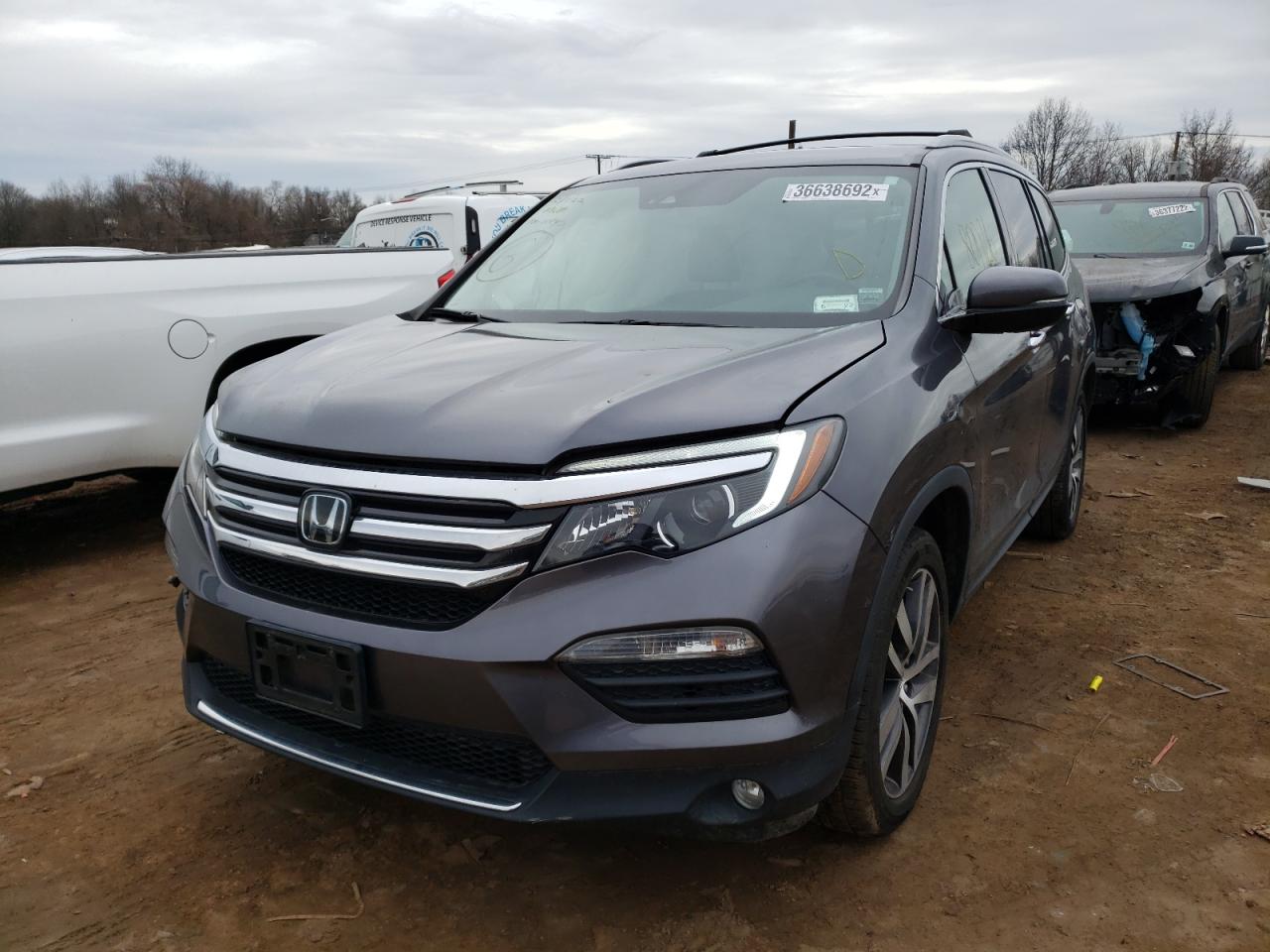 Photo 2 from auction – 2017 HONDA PILOT ELIT with VIN 5FNYF6H01HB015371