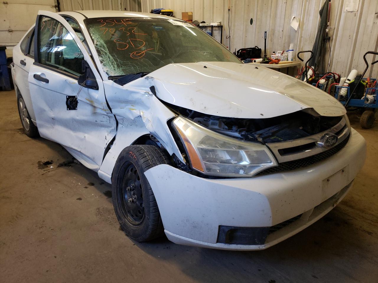 FORD FOCUS S 2009 with VIN 1FAHP34N89W233887 - Photo from auction