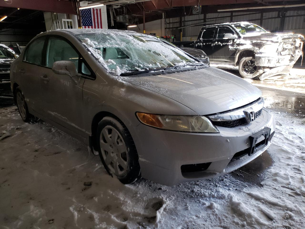 HONDA CIVIC LX 2010 with VIN 19XFA1F58AE027956 - Photo from auction