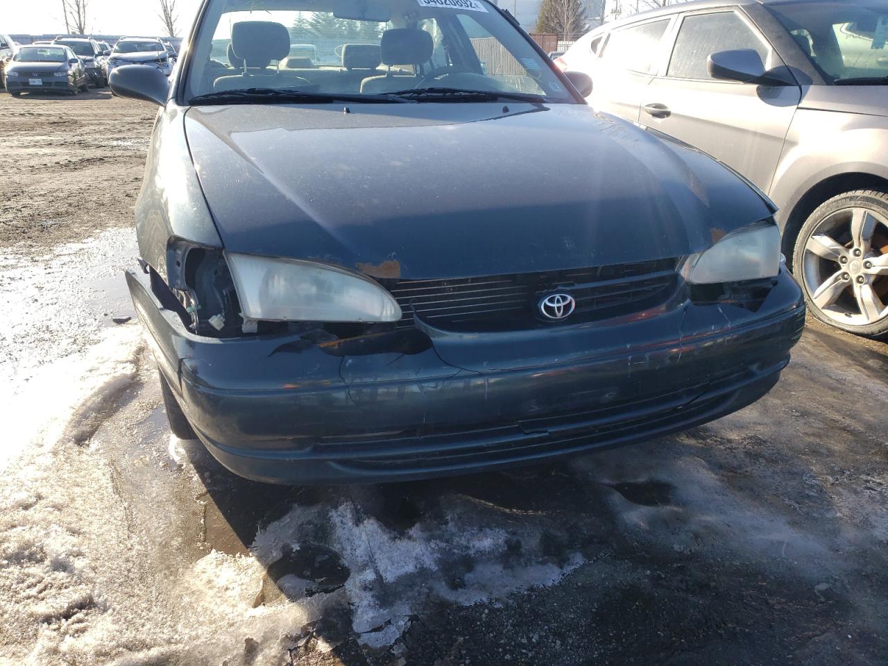 Photo 9 from auction – 1999 TOYOTA COROLLA VE with VIN 2T1BR12E4XC769033