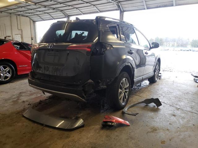 Photo 9 from auction – 2018 TOYOTA RAV4 HV LE with VIN JTMRJREV4JD200239