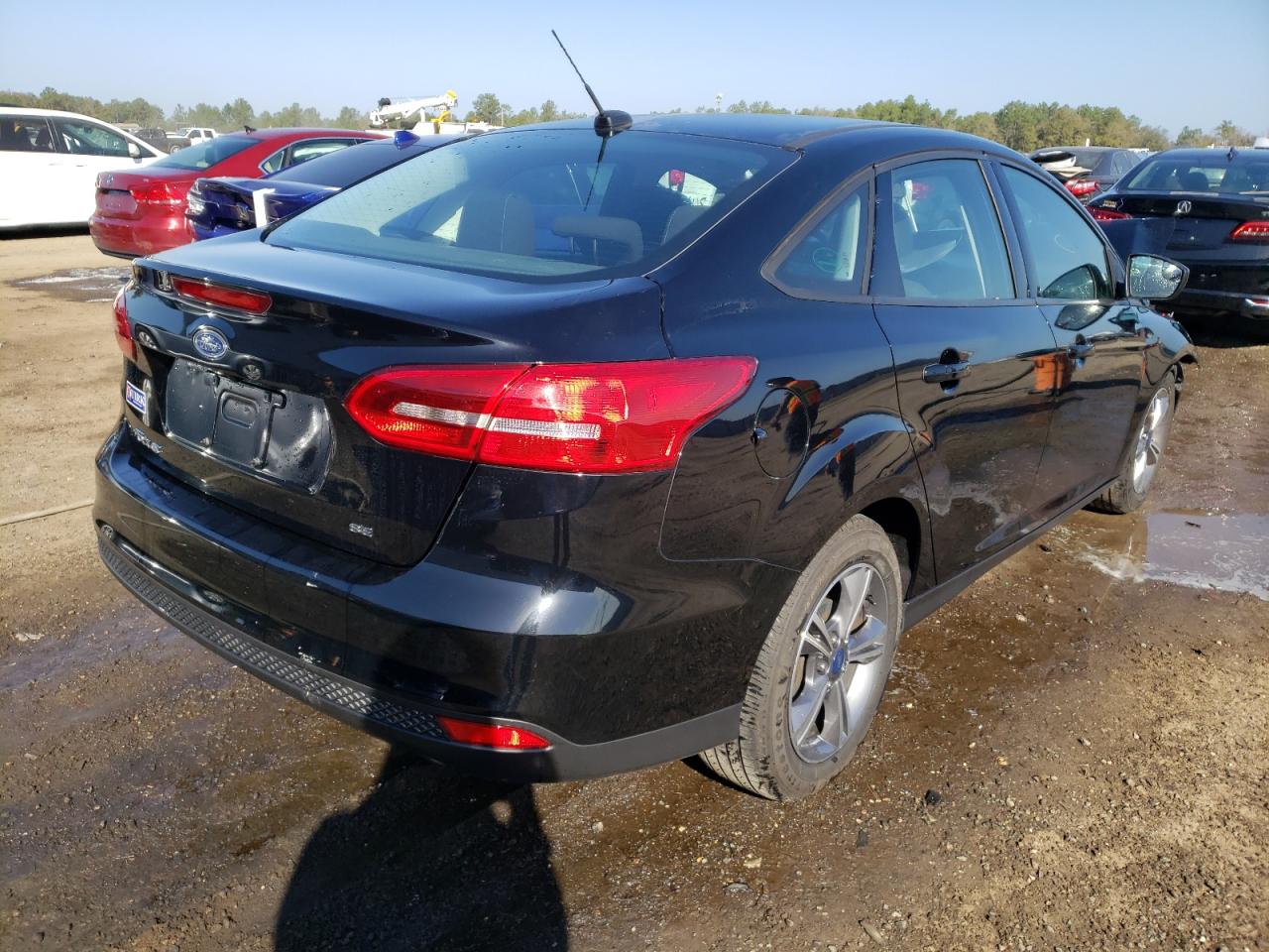 Photo 4 from auction – 2018 FORD FOCUS SE with VIN 1FADP3F29JL306403