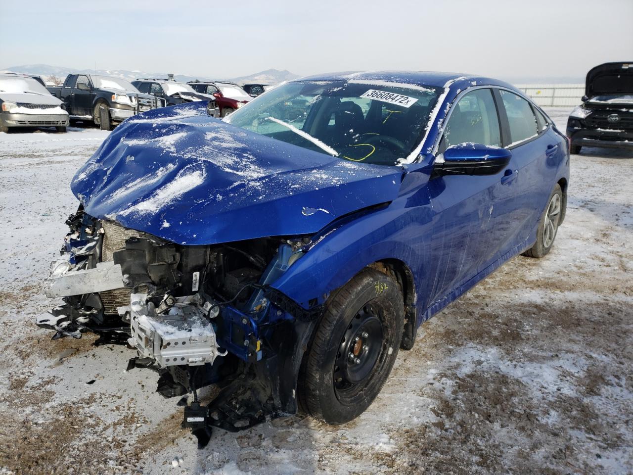 Photo 2 from auction – 2019 HONDA CIVIC LX with VIN 19XFC2F69KE212012