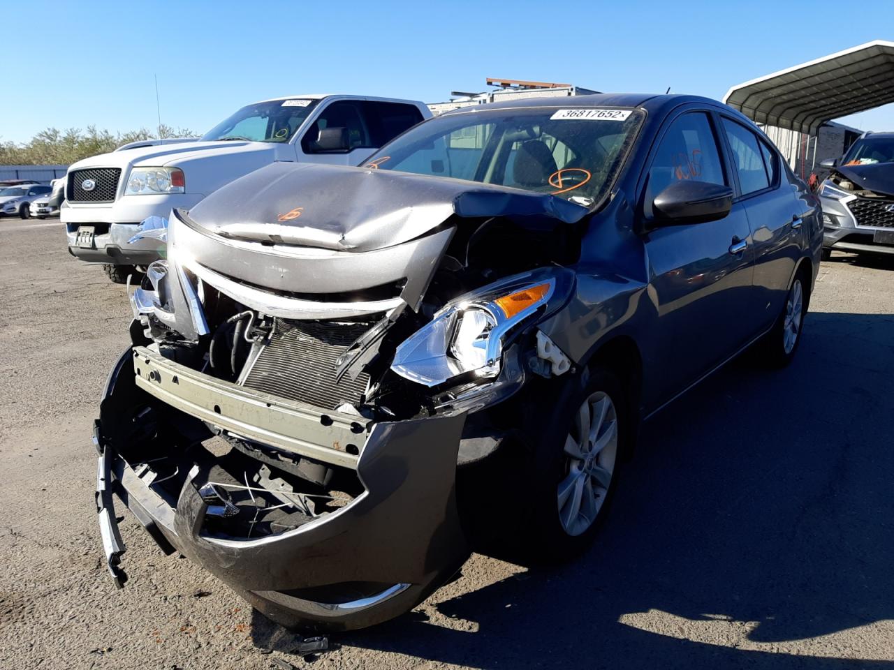 Photo 2 from auction – 2016 NISSAN VERSA S with VIN 3N1CN7AP1GL866017
