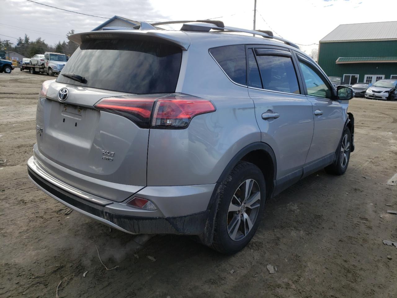 Photo 4 from auction – 2016 TOYOTA RAV4 XLE with VIN 2T3RFREV1GW442158