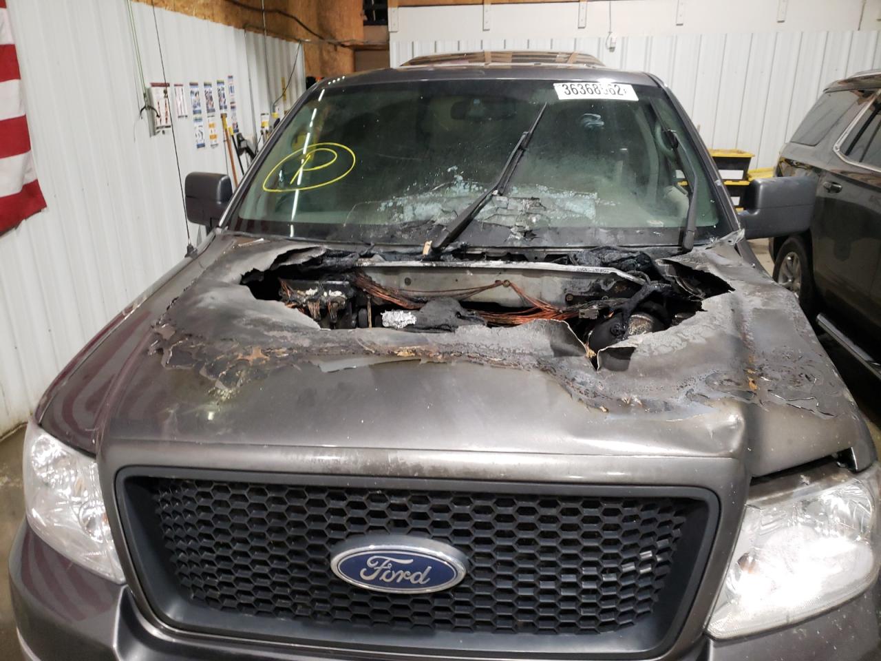 Photo 12 from auction – 2005 FORD F150 with VIN 1FTPX14555FA63380