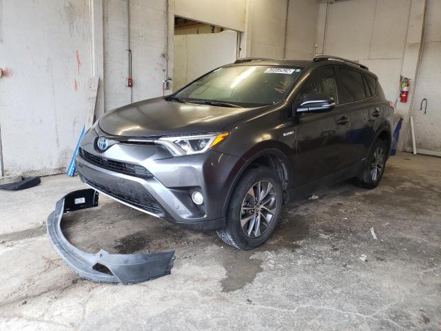Photo 2 from auction – 2018 TOYOTA RAV4 HV LE with VIN JTMRJREV4JD200239