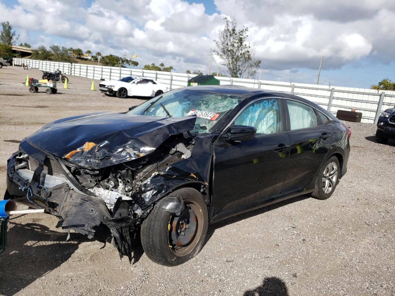 Photo 2 from auction – 2016 HONDA CIVIC LX with VIN 19XFC2F54GE041913
