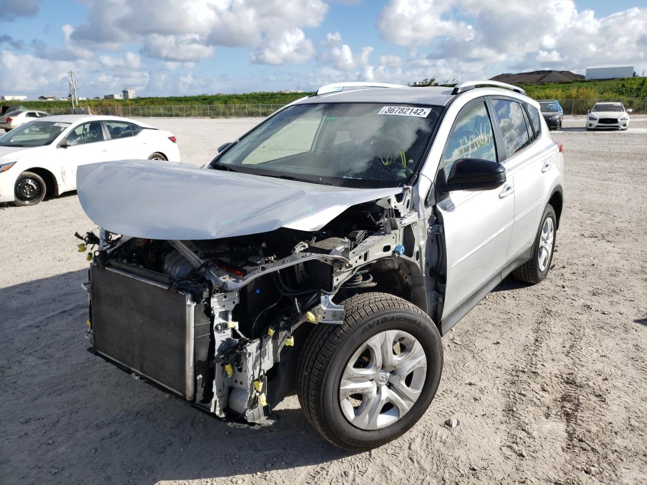 Photo 2 from auction – 2013 TOYOTA RAV4 LE with VIN JTMZFREV8DD013060