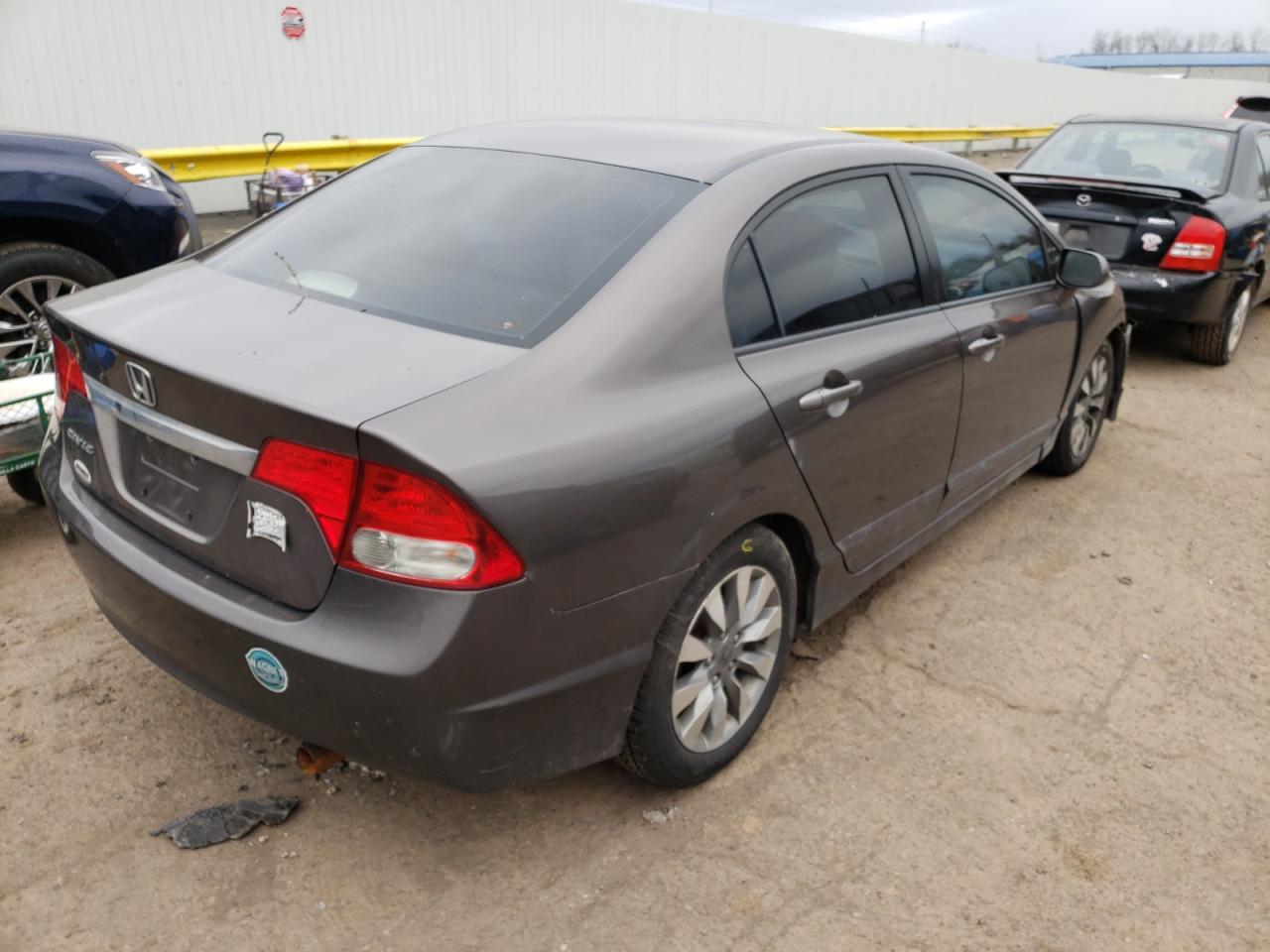 Photo 4 from auction – 2010 HONDA CIVIC EXL with VIN 2HGFA1F91AH520953