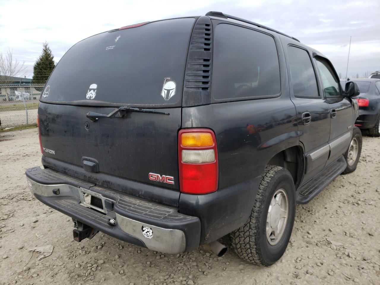 Photo 4 from auction – 2003 GMC YUKON with VIN 1GKEK13V63R312535
