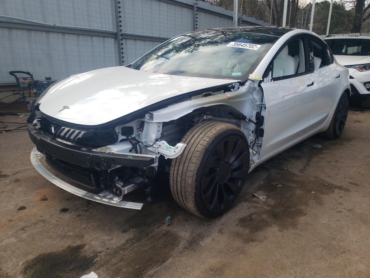 Photo 2 from auction – 2021 TESLA MODEL 3 with VIN 5YJ3E1EC2MF980927
