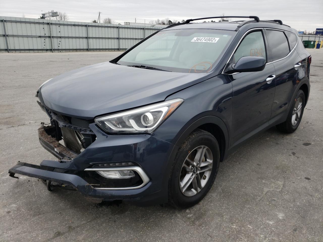 Photo 2 from auction – 2017 HYUNDAI SANTA FE S with VIN 5NMZU3LB1HH017654
