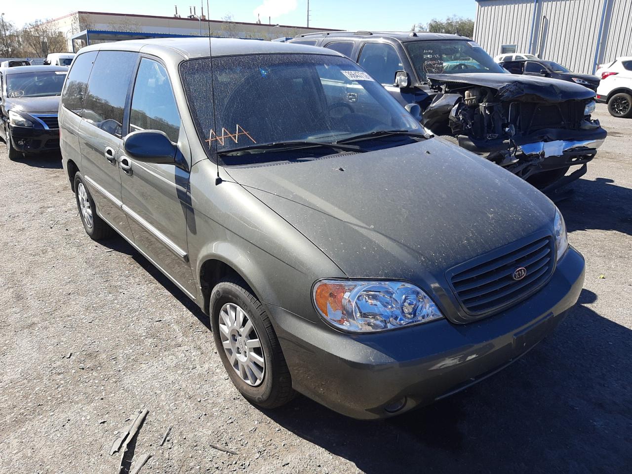 KIA SEDONA EX 2003 with VIN KNDUP131X36425945 - Photo from auction